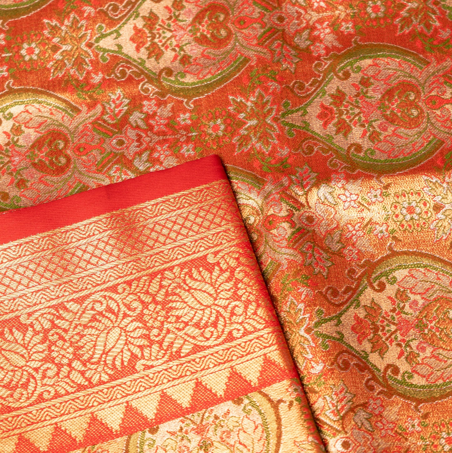 Light Orange Art Tissue Kanchipuram Saree with Border